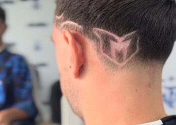 El particular homenaje del Dibu Martínez a Lionel Messi: nuevo look en la nuca para su despedida de la Selección
