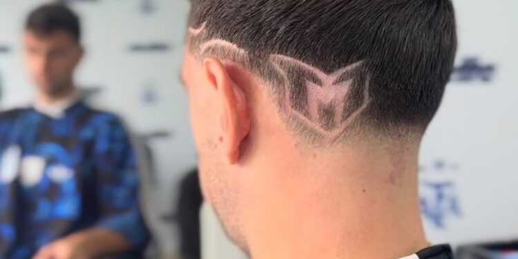 El particular homenaje del Dibu Martínez a Lionel Messi: nuevo look en la nuca para su despedida de la Selección