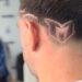 El particular homenaje del Dibu Martínez a Lionel Messi: nuevo look en la nuca para su despedida de la Selección